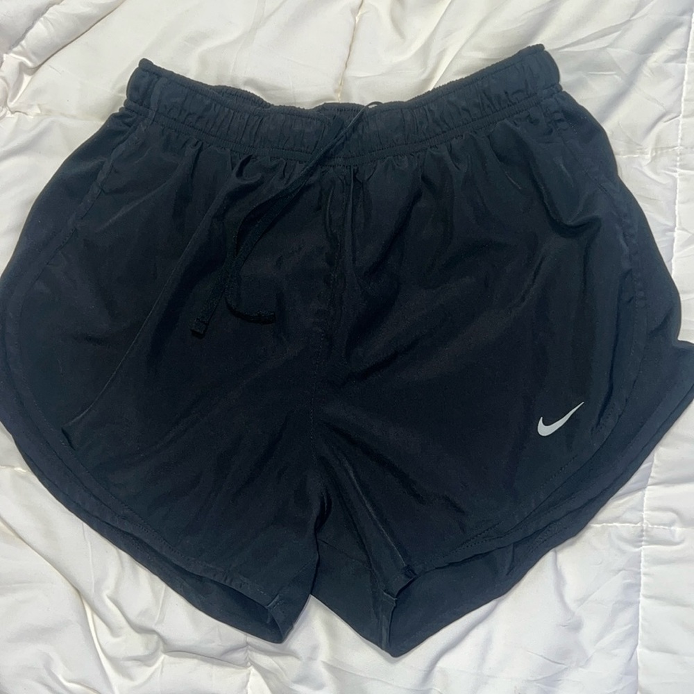Black Nike running shorts